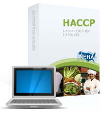 Laptop in front of the HACCP textbook